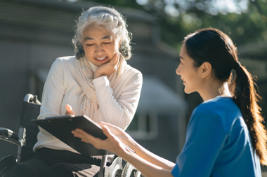 elderly health checkup with a nurse at home